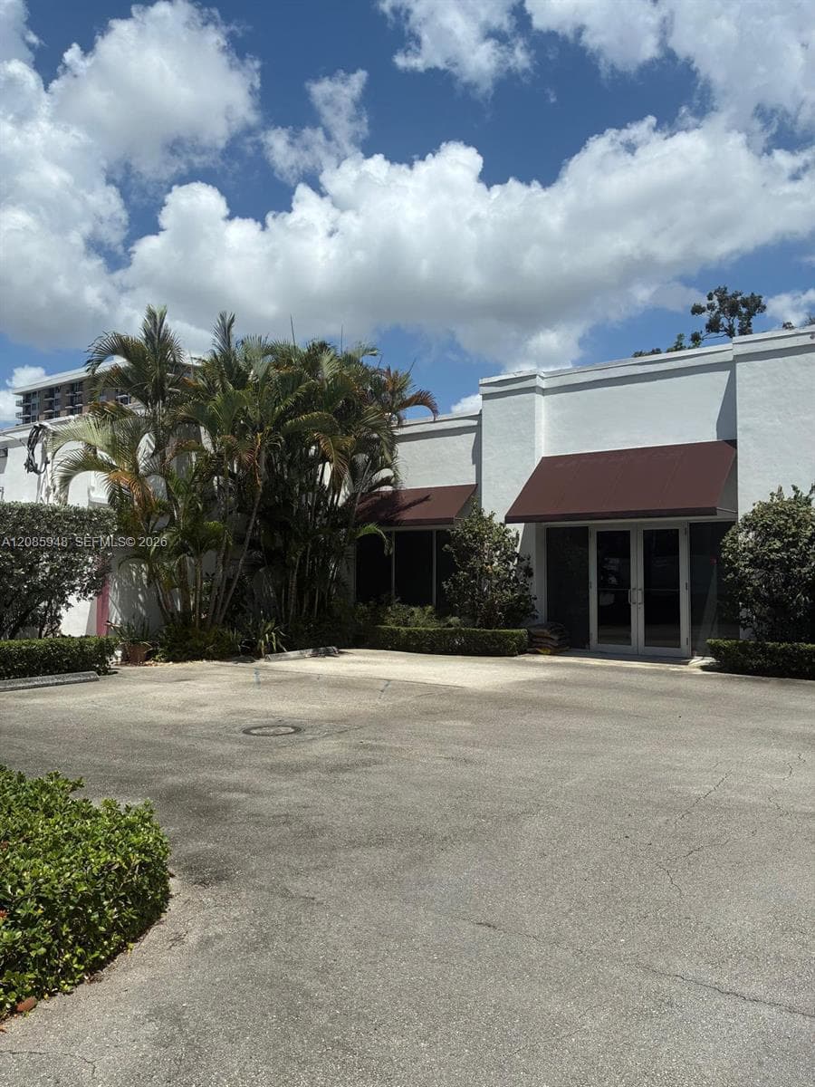 105, 111, 119 NE 21 Street